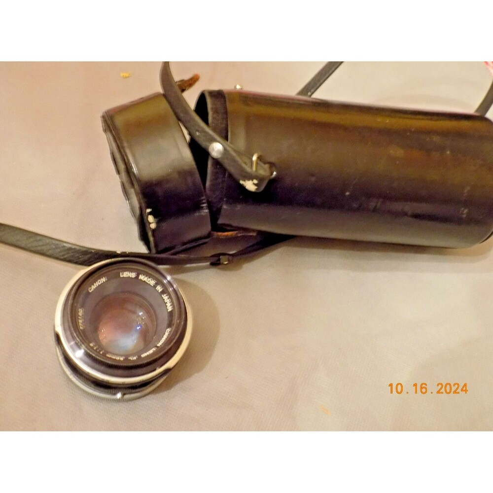Vintage Canon camera lens and case cover